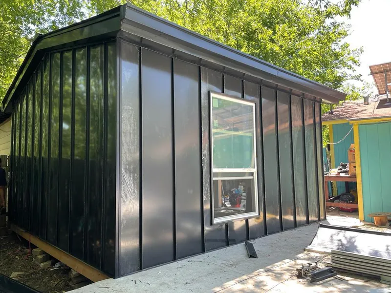 Black standing seam metal wall panels for Metal Roof Installation in Smithfield